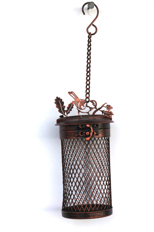 A hanging metal lantern with a dark bronze mesh cylinder body, decorative branch and bird motifs at the top, and a chain with hook hanging against a plain white background.