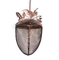 metal birdfeeder hanging in front of white back ground finished in a bronze copper finish