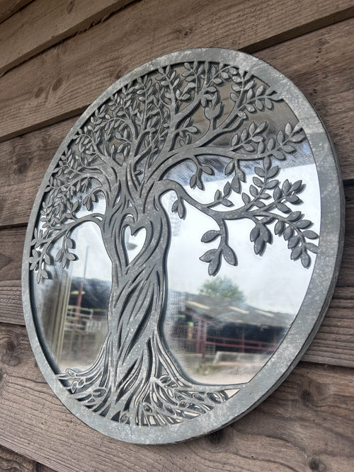 metal wall art on wooden wall antique grey finish with mirror tree of life