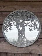 metal wall art on wooden wall antique grey finish with mirror tree of life