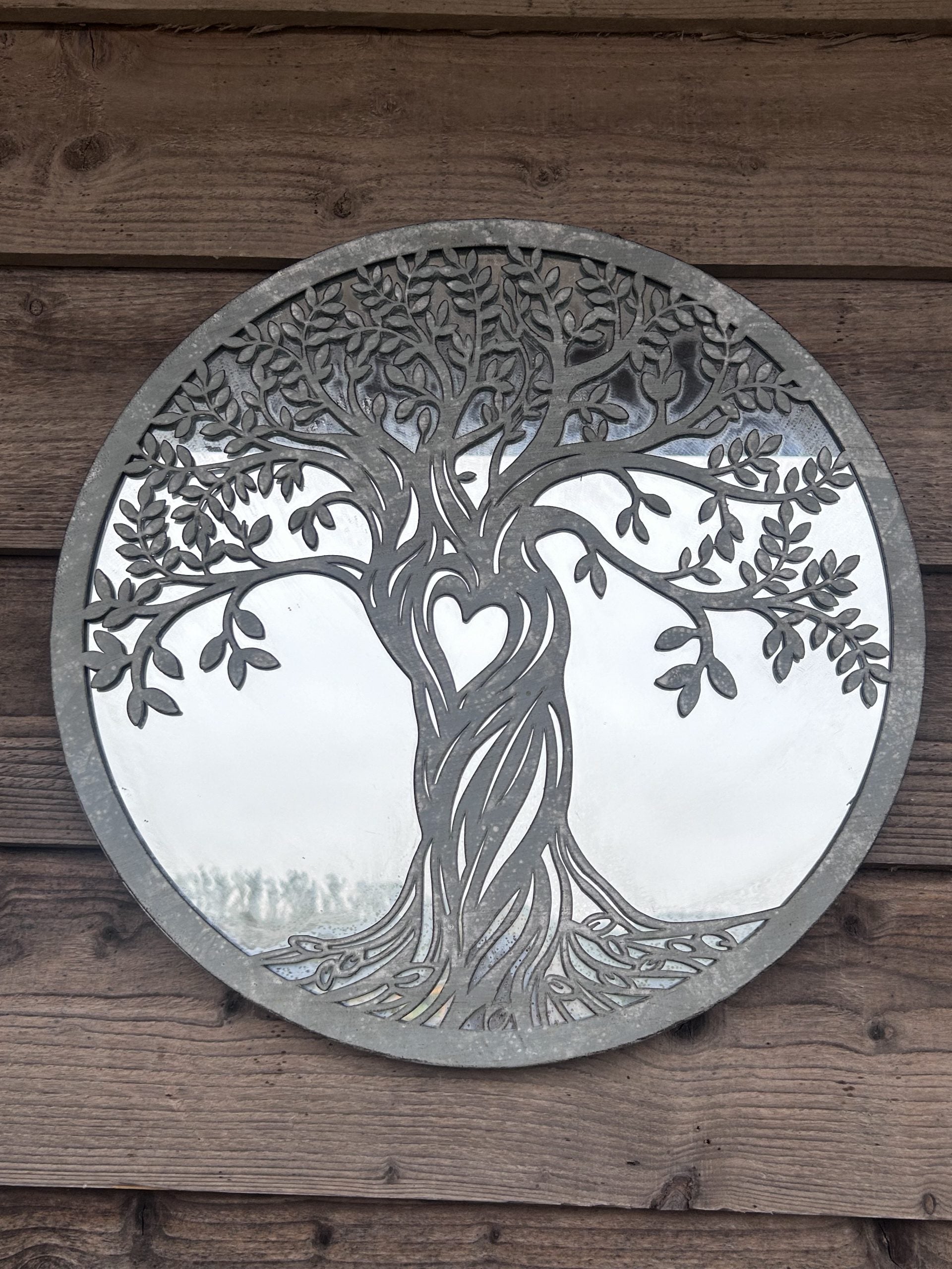 metal wall art on wooden wall antique grey finish with mirror tree of life