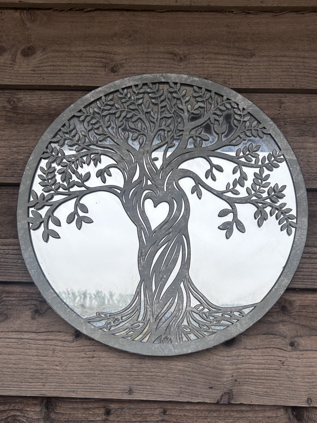 metal wall art on wooden wall antique grey finish with mirror tree of life