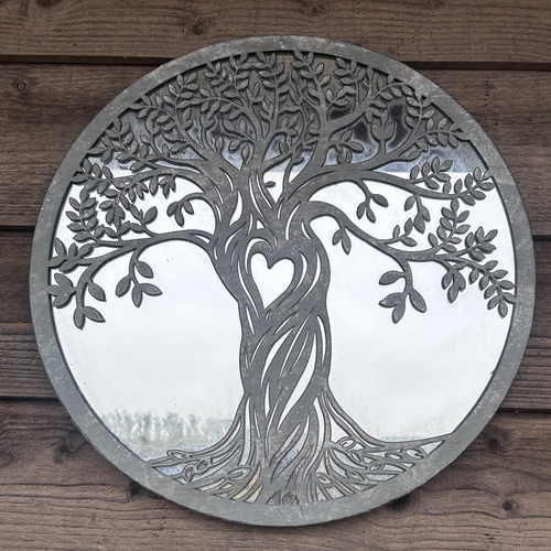 Enhance your home or garden with this 50cm Tree of Life metal wall art. Laser cut steel with an elegant antique grey mirrored finish, perfect for indoor or outdoor décor.