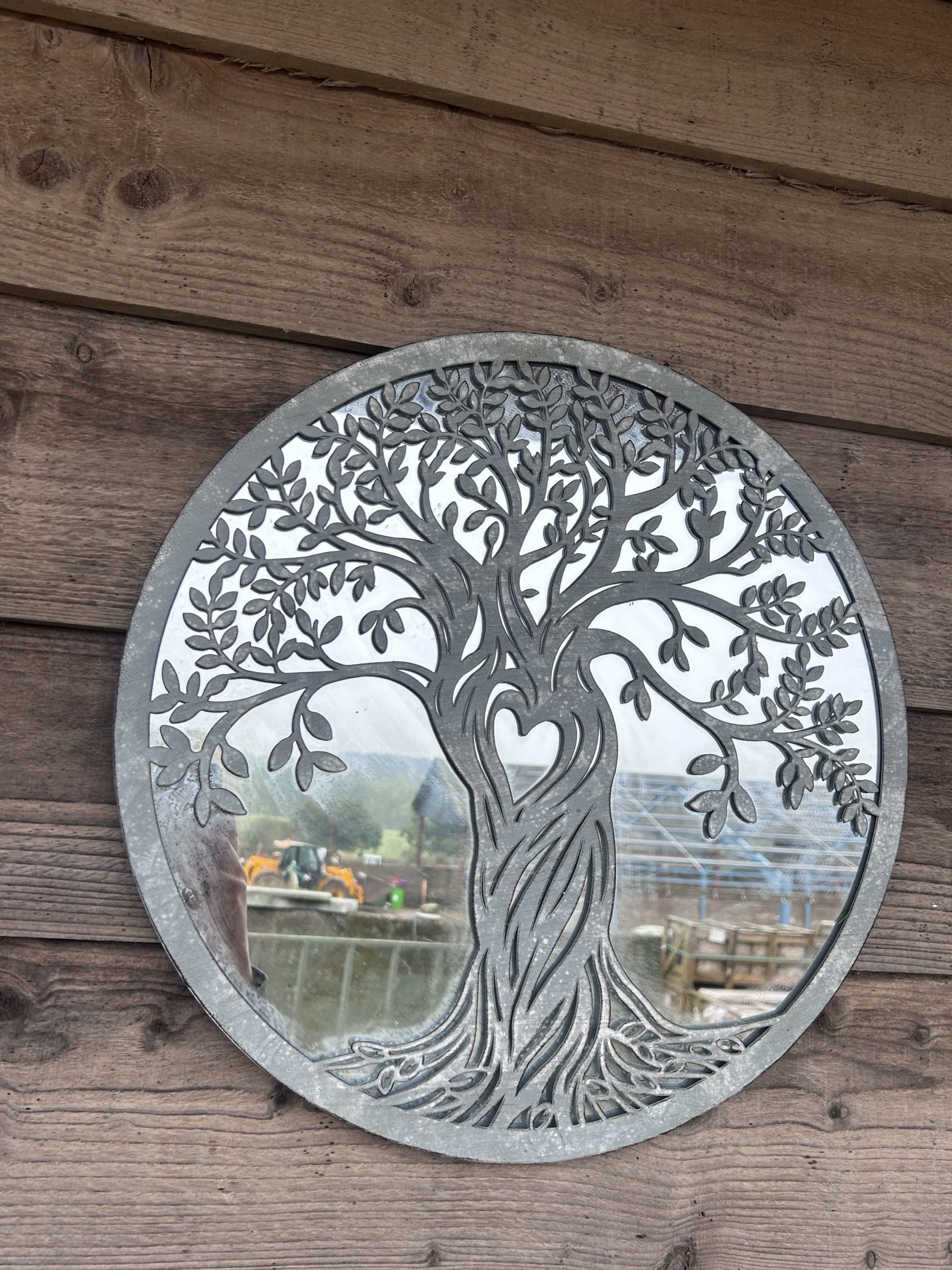 metal wall art on wooden wall antique grey finish with mirror tree of life